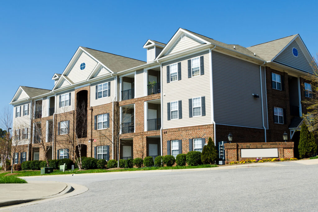 Apartment complex exterior after professional pressure washing of walls, balconies, and entry areas in Sydney